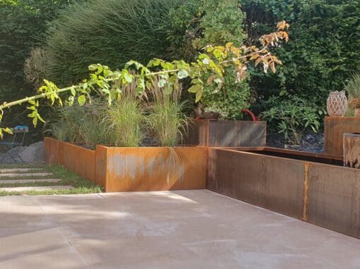Réalisation d’une fontaine en Corten, aménagement complet d’une terrasse 